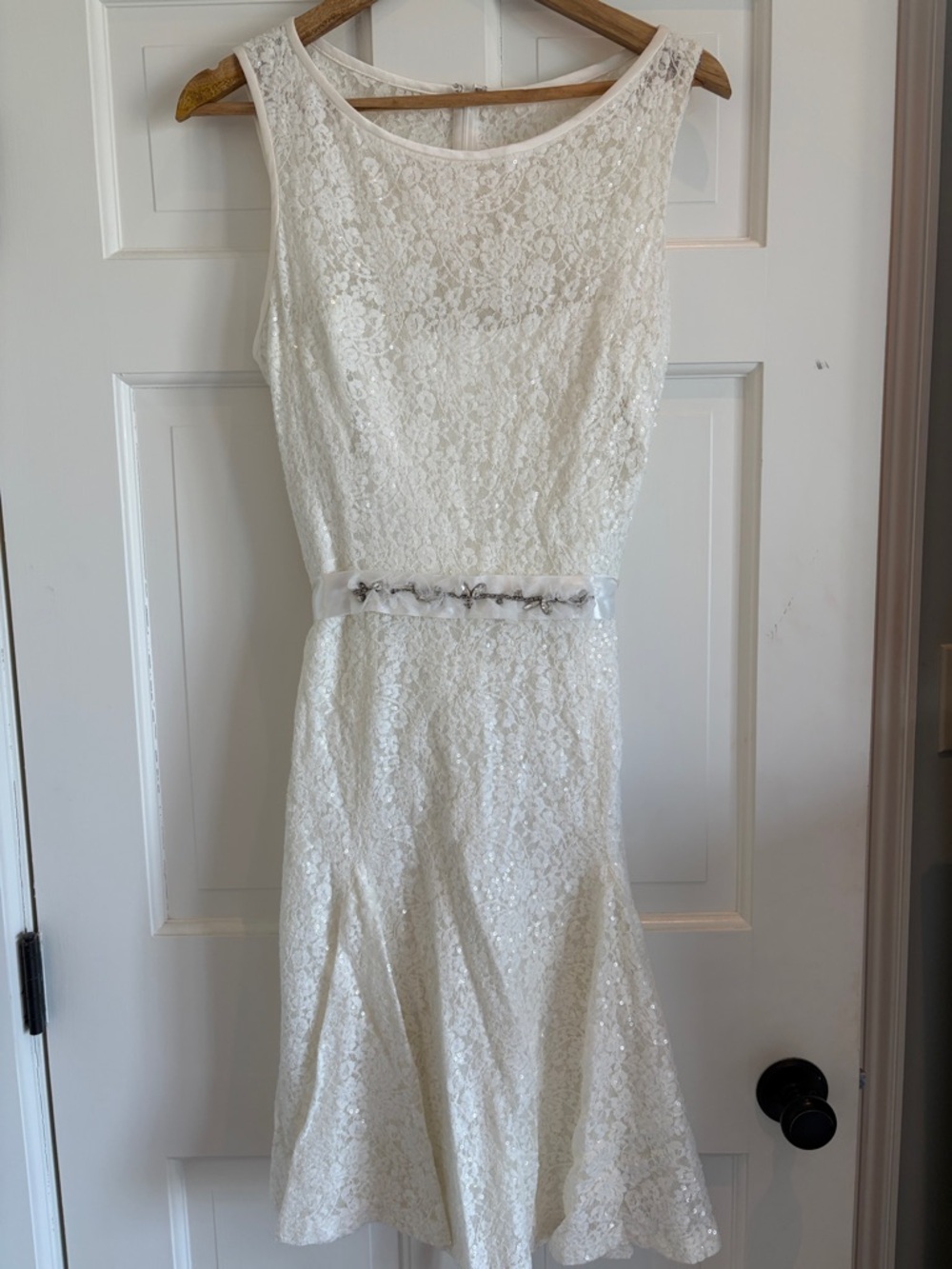 Sleeveless White Lace Midi Dress with Embellished Waist